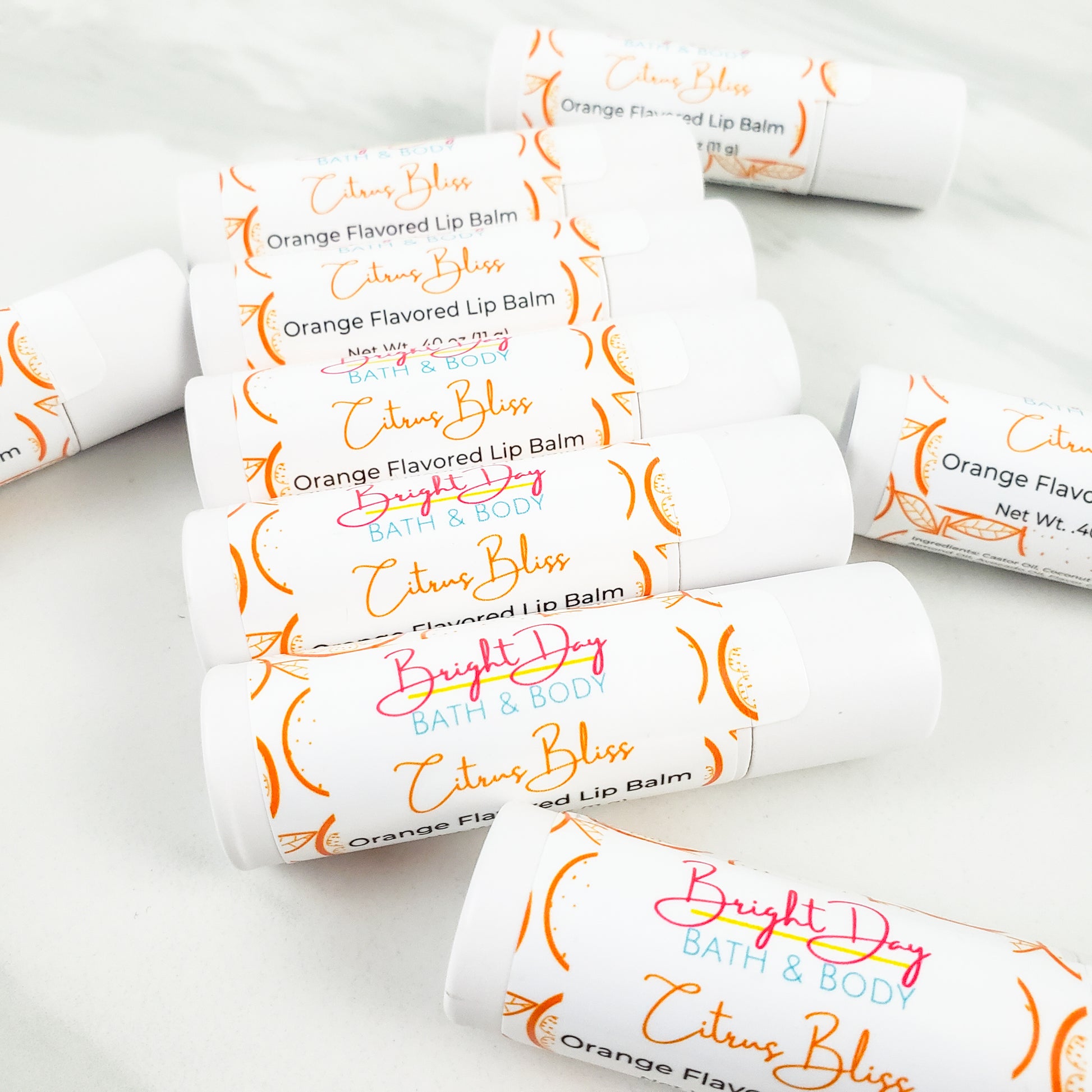 several Citrus Bliss lip balms in a row