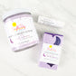 a Sweet Dreams body scrub, soap bar and lip balm on a marble background